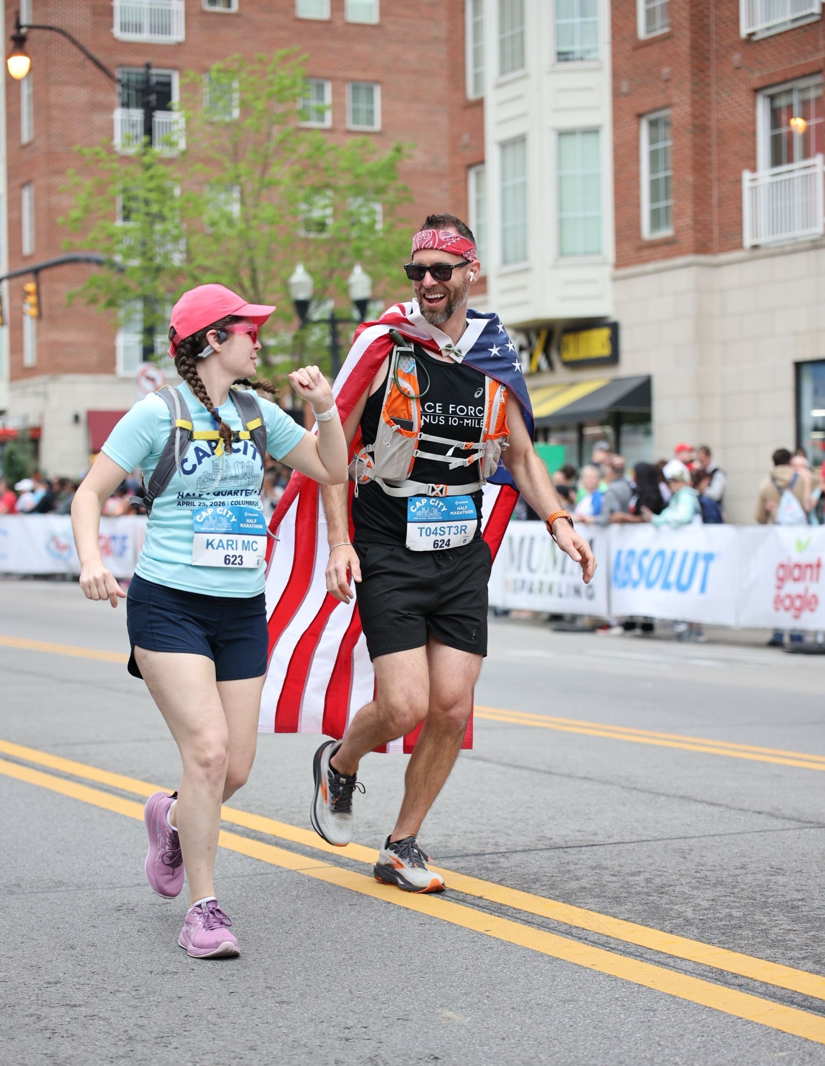 Kari and James running Cap City Half Marathon